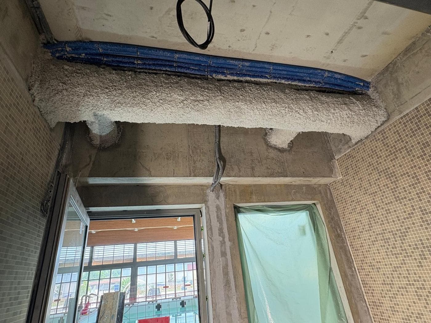 Flocage coupe-feu et stable au feu — Linteau béton
